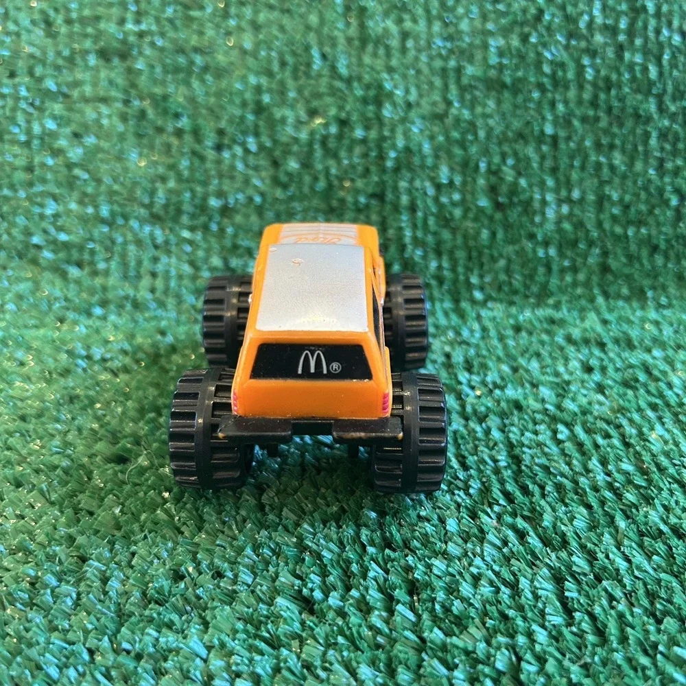 McDonalds Happy Meal Toys‎ 1987 Ford Bigfoot Trucks, orange truck